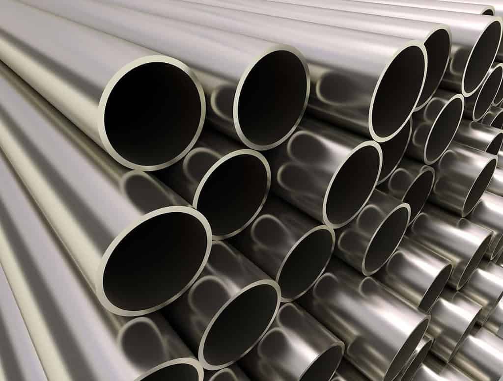 up close image of pile of steel pipes