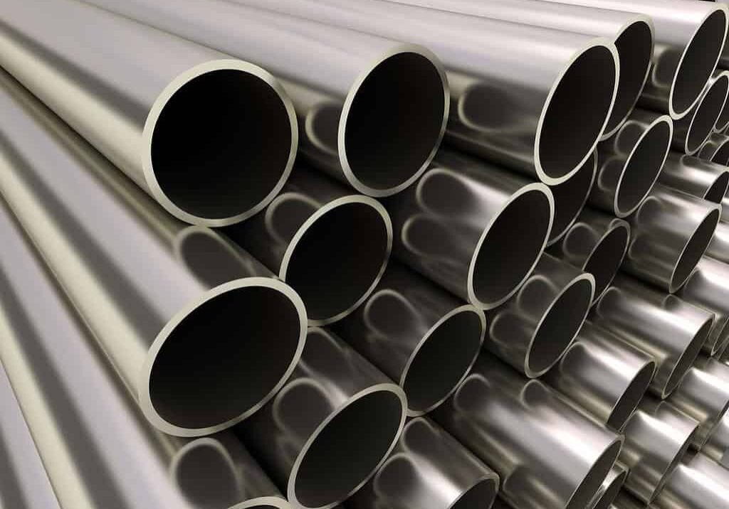 up close image of pile of steel pipes